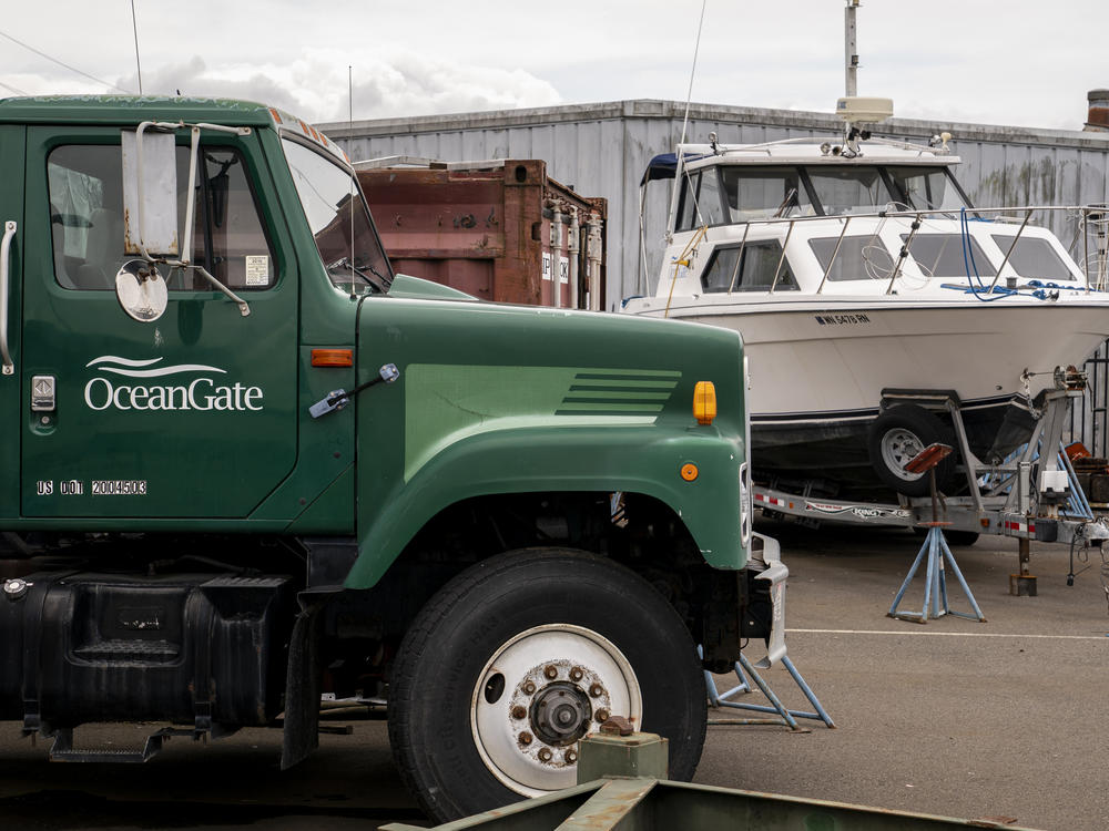 The OceanGate logo is seen on a vehicle stored near the company's offices on Wednesday in Everett, Wash. The company owns the submersible that has been missing since Sunday.