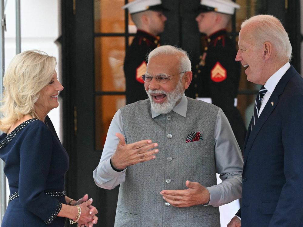 US President Joe Biden and First Lady Jill Biden greet India's Prime Minister Narendra Modi as he arrives at the South Portico of the White House in Washington, DC.