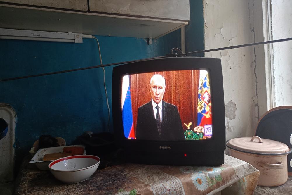 Russian President Vladimir Putin is seen on television in St. Petersburg, Russia, addressing his nation in connection with the Wagner Group rebellion led by Yevgeny Prigozhin.