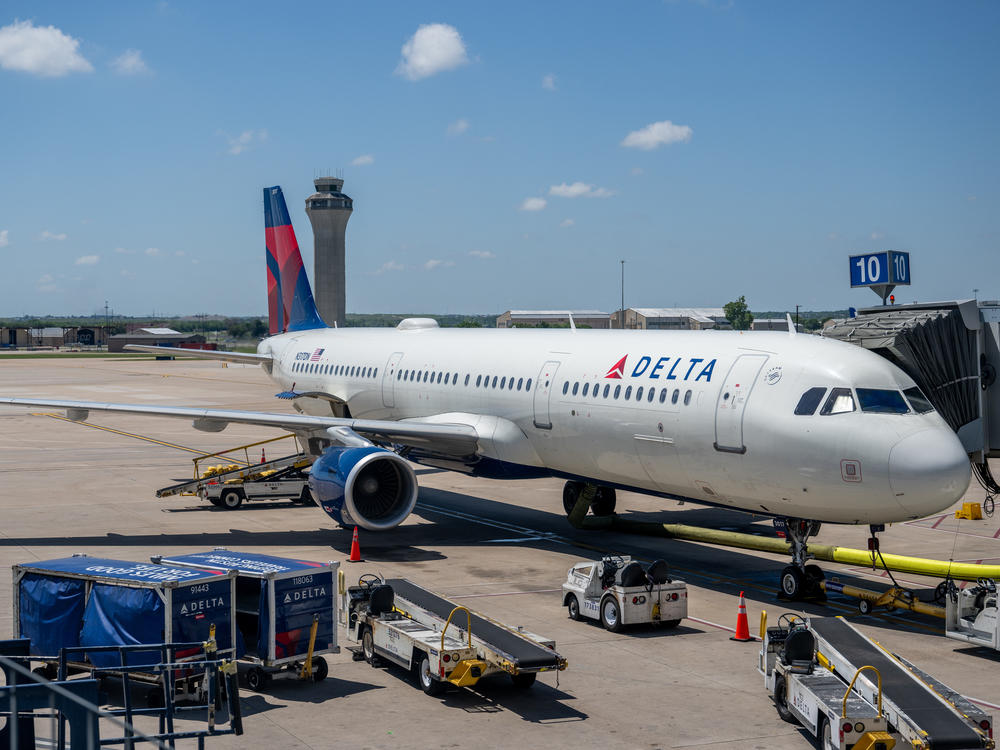 A Delta Air Lines plane is seen waiting in April at the Austin-Bergstrom International airport in Austin, Texas.
