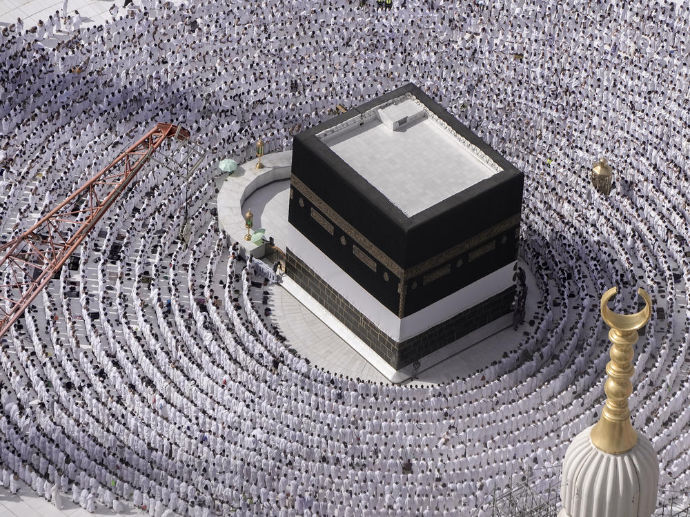 Muslim pilgrims pray around the Kaaba, the cubic building at the Grand Mosque, during the annual Hajj pilgrimage in Mecca, Saudi Arabia, Sunday.