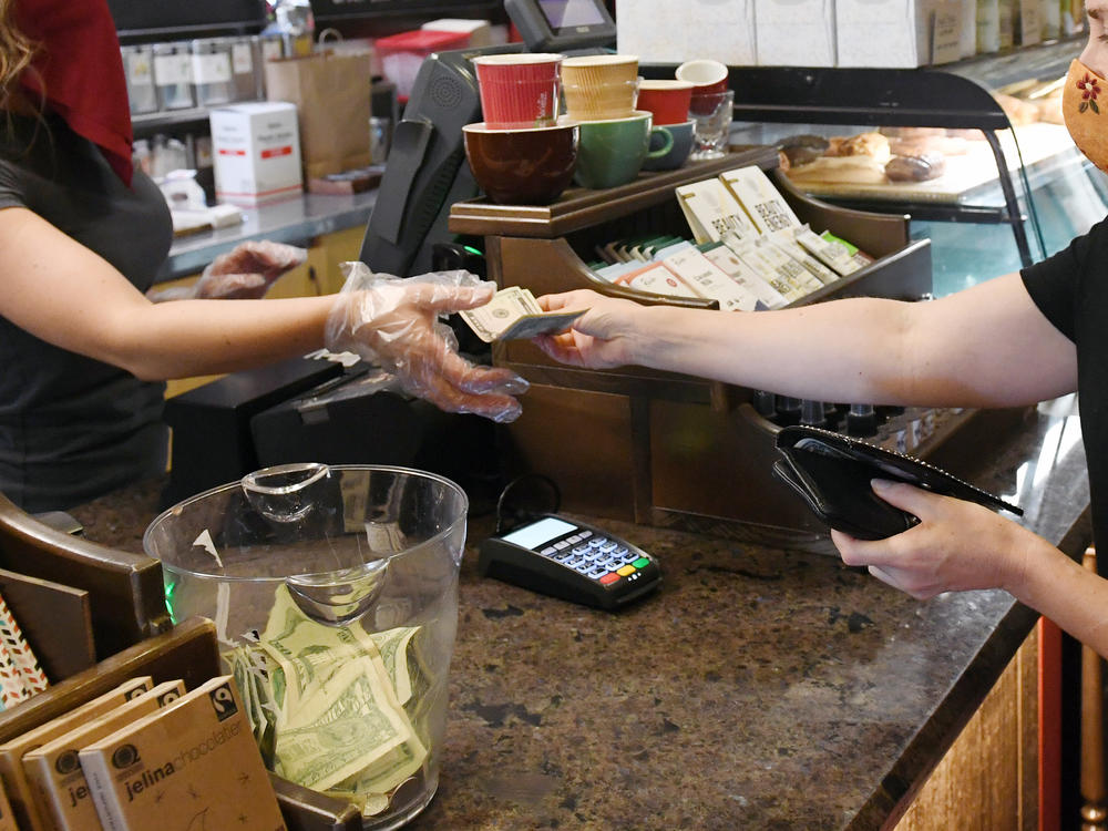 Tipping machines have replaced tip jars in many places as more people pay electronically.
