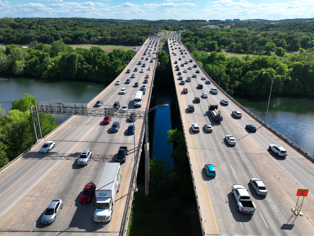 More than 50 million Americans are expected to travel at least 50 miles from home over the upcoming July Fourth weekend. Traffic in Austin, Texas, is seen here in April.
