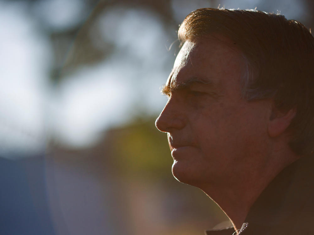 Brazil's former President Jair Bolsonaro at Brasilia International Airport on Thursday.