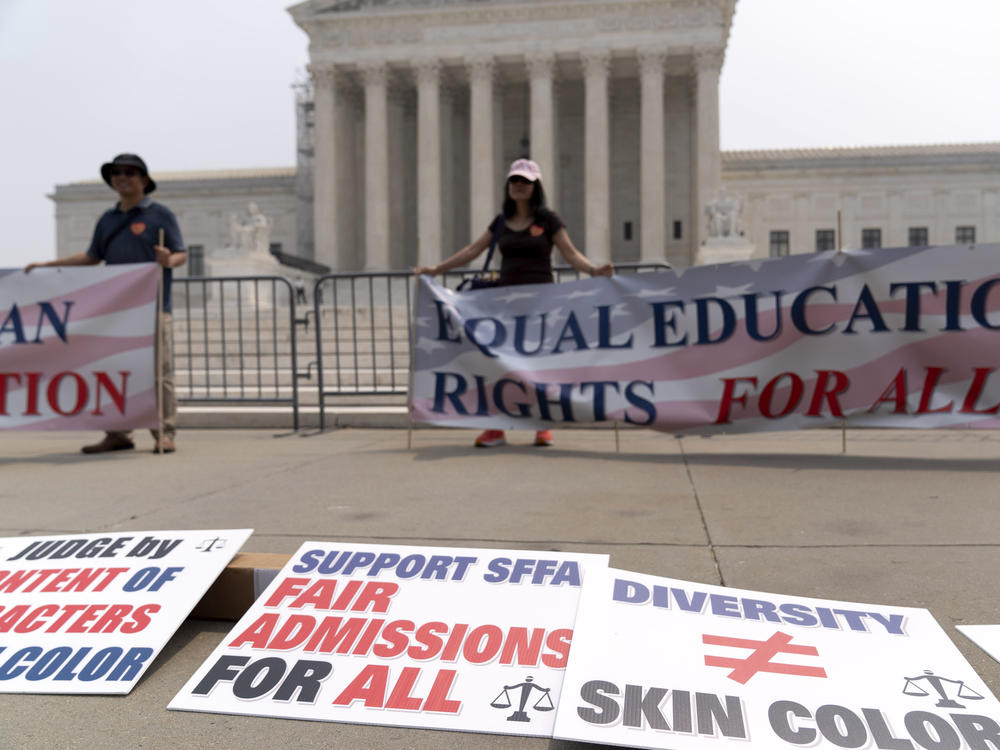 People protest outside the Supreme Court in Washington, D.C., on Thursday. The Supreme Court on Thursday struck down affirmative action in college admissions, declaring race cannot be a factor and forcing institutions of higher education to look for new ways to achieve diverse student bodies.
