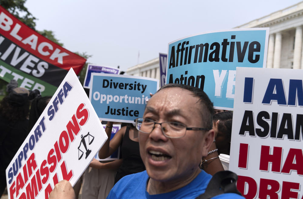 Demonstrators protest outside of the Supreme Court in Washington, D.C., on Thursday after the Supreme Court struck down affirmative action in college admissions, saying race cannot be a factor.