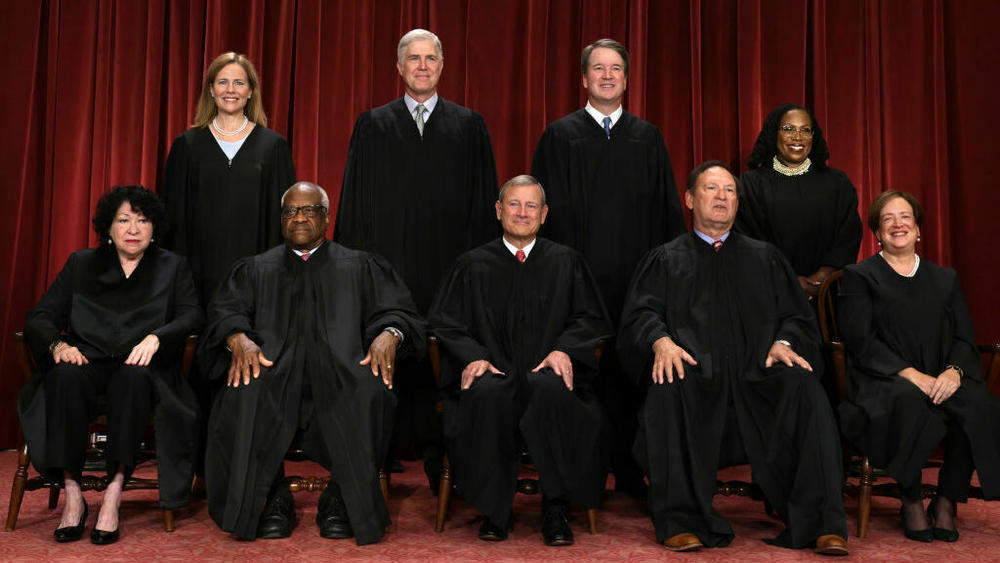 United States Supreme Court justices are pictured in October 2022: Sonia Sotomayor (front row from left), Clarence Thomas, Chief Justice John Roberts, Samuel Alito, and Associate Justice Elena Kagan; Amy Coney Barrett (back row from left), Neil Gorsuch, Brett Kavanaugh and Ketanji Brown Jackson.