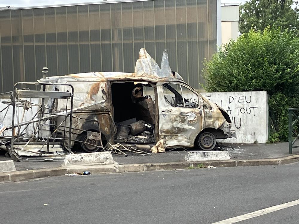 The remains of a burned out vehicle in Nanterre, France.