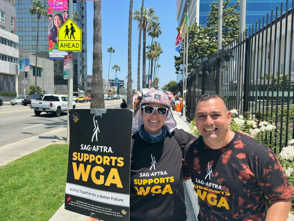 Elizabeth Mihalek and Vincent Amaya are background actors and members of SAG-AFTRA. They picketed in solidarity with striking writers outside Netflix this week.