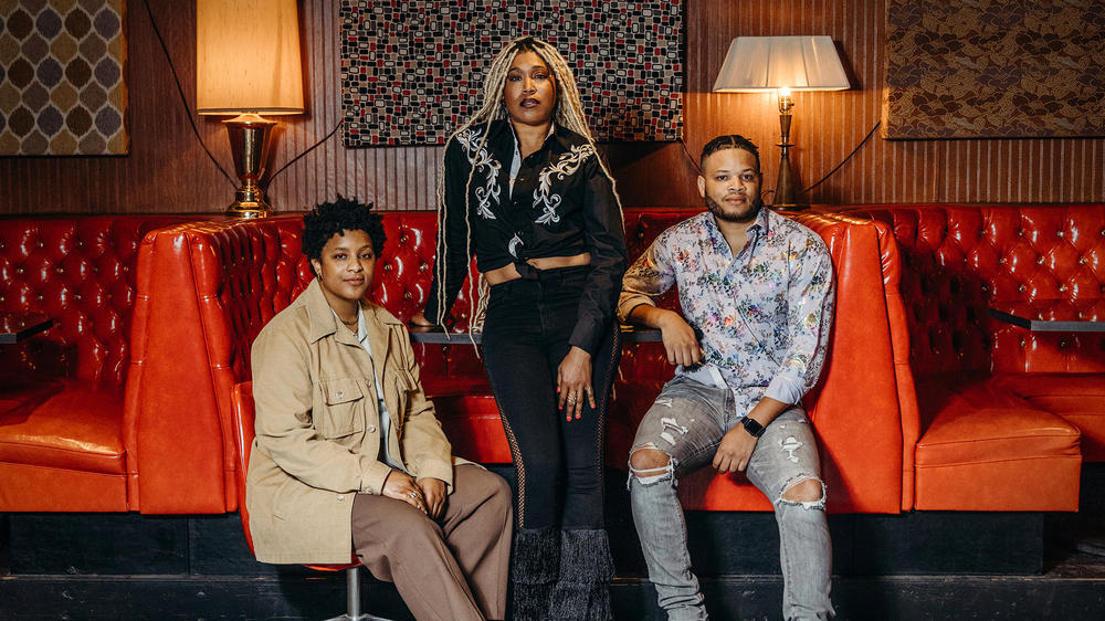 Musicians Denitia, Larysa Jaye and Tylar Bryant pose for a photo before their set at Lulu's Downstairs in Manitou Springs, Colo., on June 17, 2023. They are members of the Black Opry, a touring musical revue dedicated to uplifting Black artists in country music.
