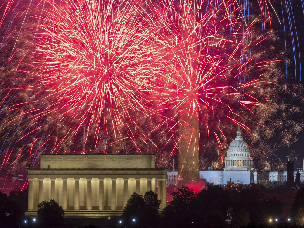 Fireworks burst on the National Mall above the Lincoln Memorial, Washington Monument and U.S. Capitol on July 4, 2022.