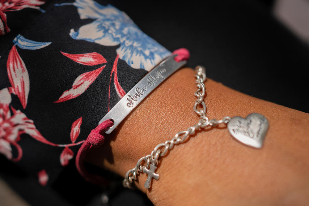 Samantha Casiano shows her bracelet with the name of her daughter Halo Hope on it. Baby Halo was born and died on March 29, 2023.