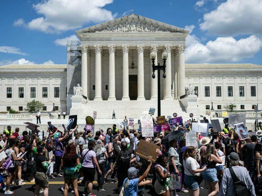 Demonstrators rally to mark the first anniversary of the US Supreme Court ruling in the <em>Dobbs v Women's Health Organization</em> case in Washington, DC on June 24, 2023.