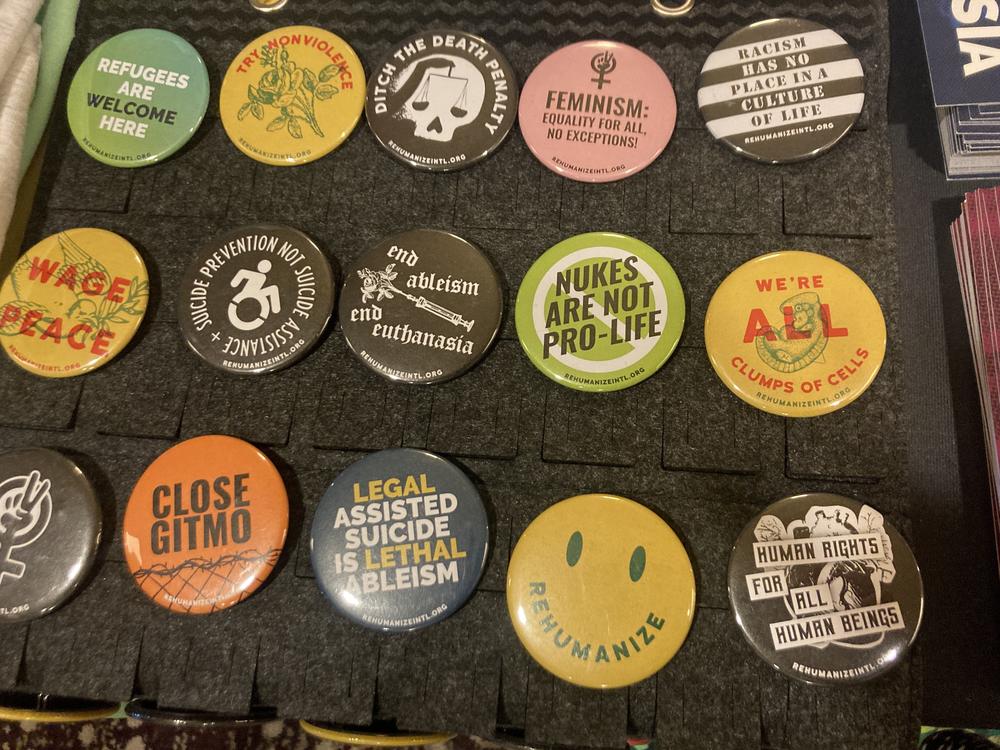 Buttons at Rehumanize International's table at the National Right to Life conference in June. The group seeks to end 