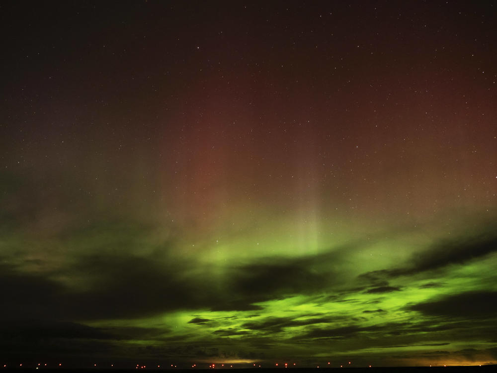 An aurora borealis, also known as the northern lights, is seen in the sky in the early morning hours of April 24, near Washtucna, Wash.