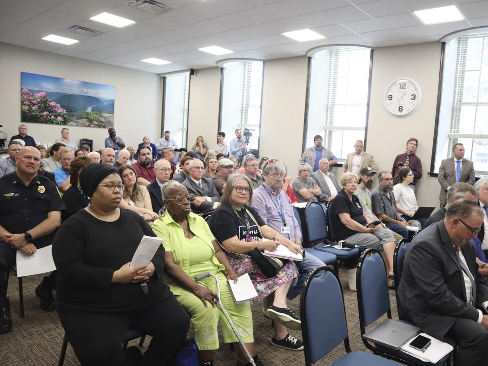 Local representatives gather in Beckley, W.Va., to select a regional representative for the nonprofit council that will be responsible for distributing funds from the state's opioid settlement. Around the country, state councils like this will decide how to spend $50 billion in opioid settlement funds.