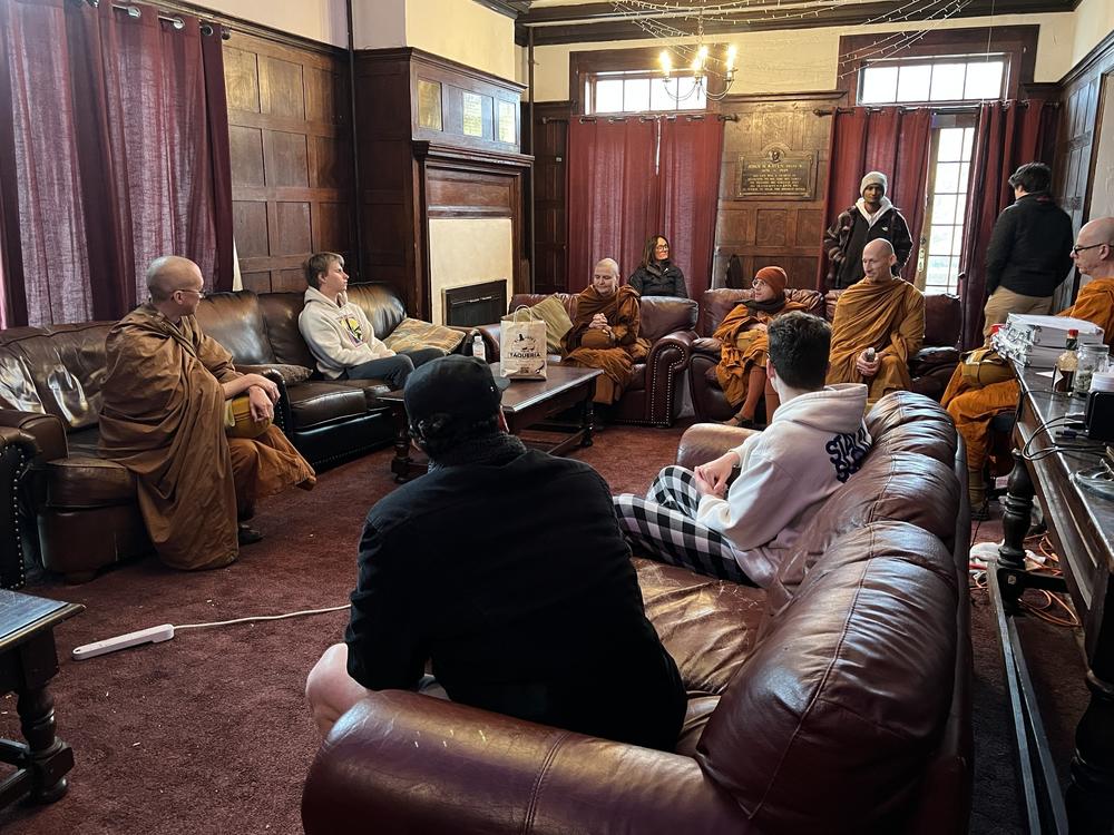 Monks from Empty Cloud Monastery visit a fraternity outside Rutgers University in New Brunswick, New Jersey where they were offered lunch.