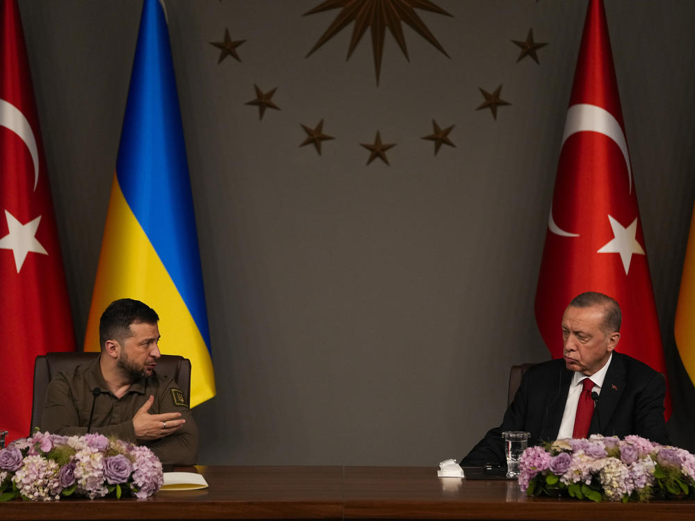 Ukraine's President Volodymyr Zelenskyy, left, talks to journalists next to Turkey's President Recep Tayyip Erdogan during a joint news conference following their meeting in Istanbul, Turkey, on Saturday.
