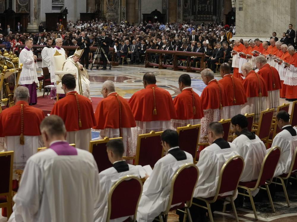 Pope Francis prays in front of new cardinals during consistory inside St. Peter's Basilica at the Vatican on Aug. 27, 2022. Pope Francis announced on Sunday that he has chosen 21 new cardinals.