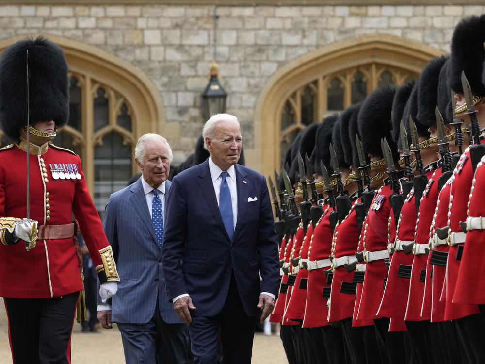 President Biden and King Charles review royal guards at Windsor Castle ahead of a meeting with philanthropists about financing clean energy projects in developing countries affected by climate change.