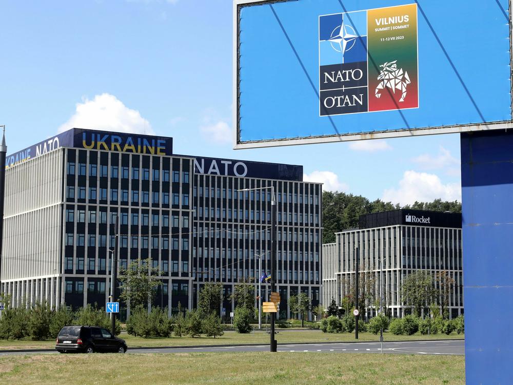 Banners reading 'Ukraine' and 'NATO' are seen on the NATO Summit venue in Vilnius, Lithuania on Sunday.