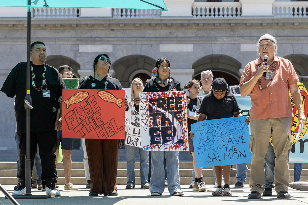 Gary Mulcahy of the Winnemem Wintu tribe (right) speaks at a rally for water rights and the environment at California's state capitol building.