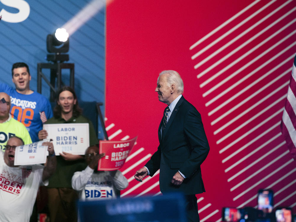President Biden arrives at a political rally in Philadelphia on June 17. He has increasingly cast his climate program as a jobs program as his reelection campaign heats up.