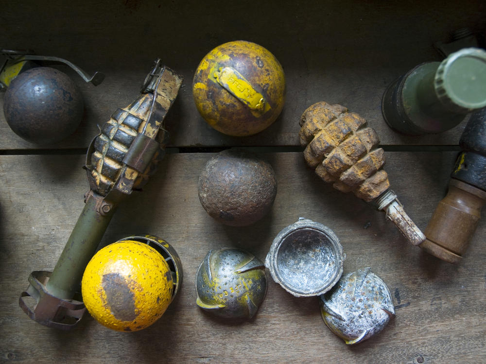 View of a collection of defused cluster bombs and grenades used by an international bomb disposal group for training in Savannakhet, Laos, on May 2, 2006.