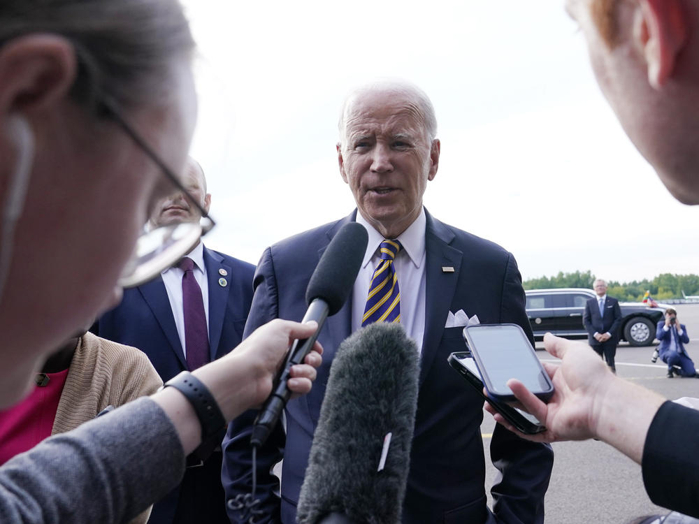 President Biden speaks to reporters before boarding Air Force One in Vilnius, Lithuania. Biden was attending the NATO summit and was heading to Helsinki, Finland.