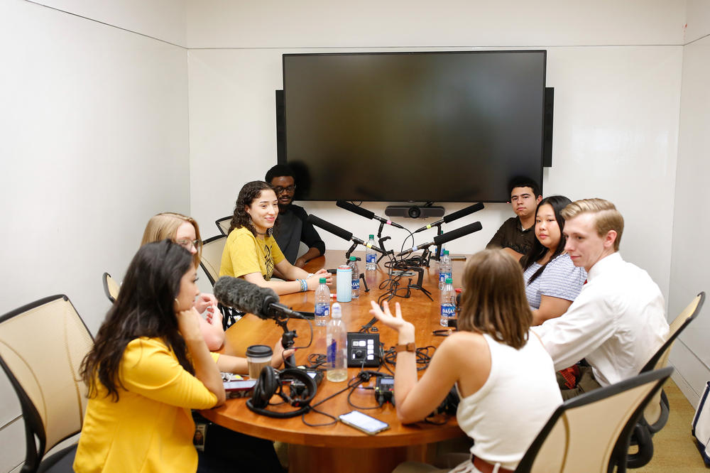 All six students told NPR reporters Elena Moore, bottom right, and Ximena Bustillo, bottom left, that they plan to vote next year. They spoke at North Carolina State University's James B. Hunt Jr. Library in Raleigh, N.C., on June 28.