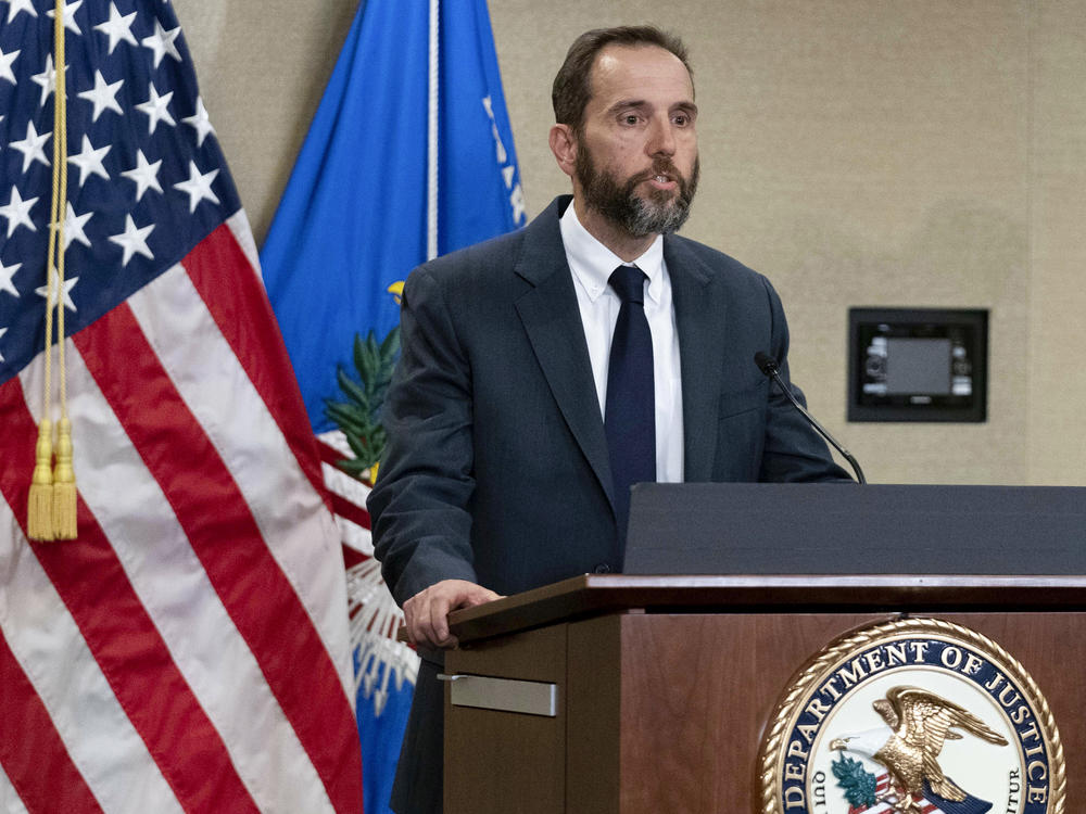 Special counsel Jack Smith speaks to reporters last month in Washington. Smith has asked a court not to delay Trump's trial indefinitely as the former president has requested.