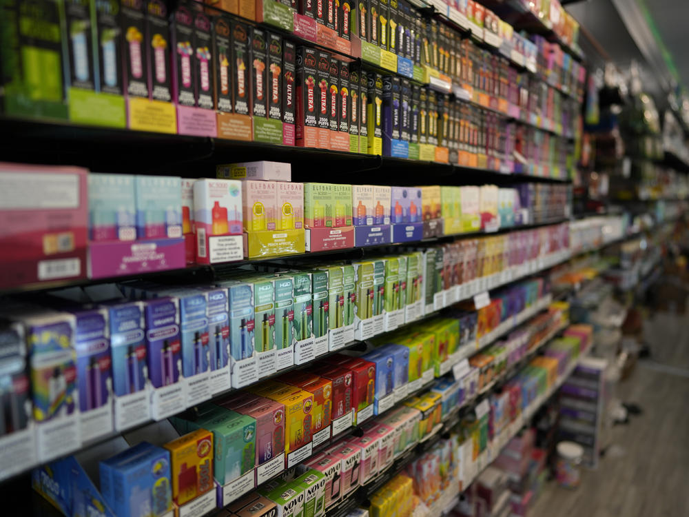 Disposable vapes in many kid-friendly fruity flavors, are displayed for sale at a shop in Pinecrest, Fla., Monday, June 26, 2023. Since 2020, the number of different vaping devices for sale in the U.S. has exploded, driven by a wave of disposable models from China.