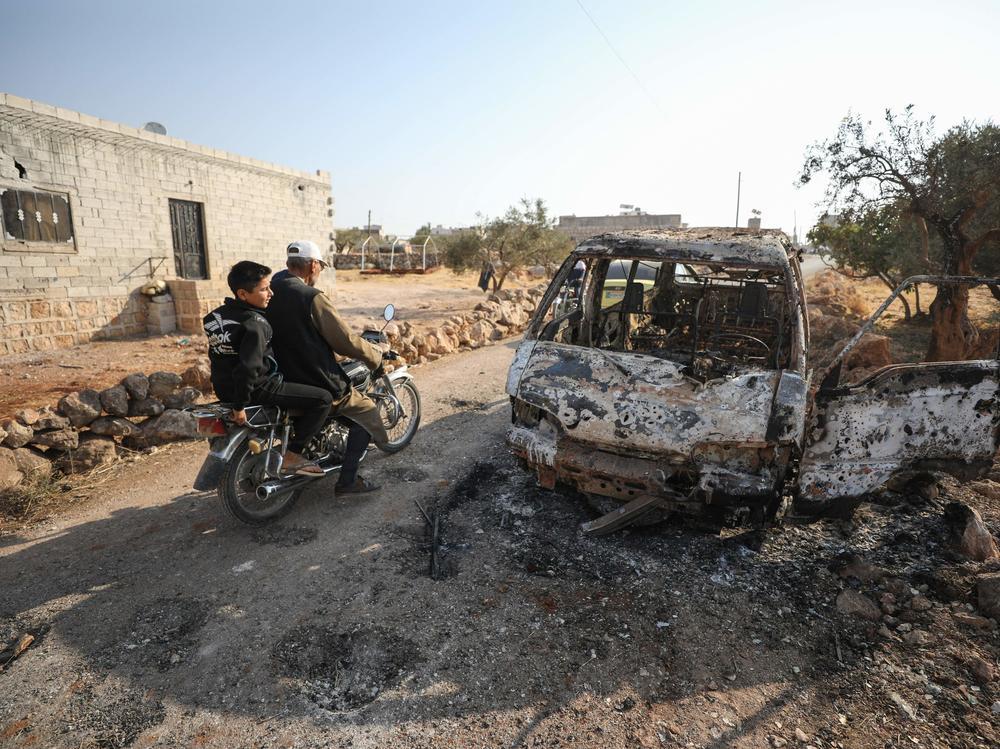 This photo, taken Oct. 27, 2019, the day after the raid on ISIS leader Abu Bakr al-Baghdadi's compound in Syria, shows the van that was targeted by U.S. airstrikes. Photos of the van prompted questions about who was targeted.