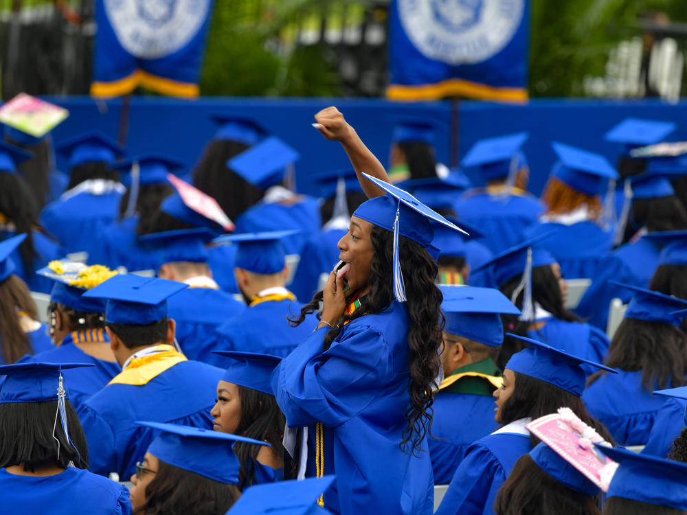Graduates attend Tennessee State University's commencement ceremony in Nashville on May 7, 2022. Under a new repayment plan, millions of student loan borrowers will see their monthly repayment amounts cut in half or more.