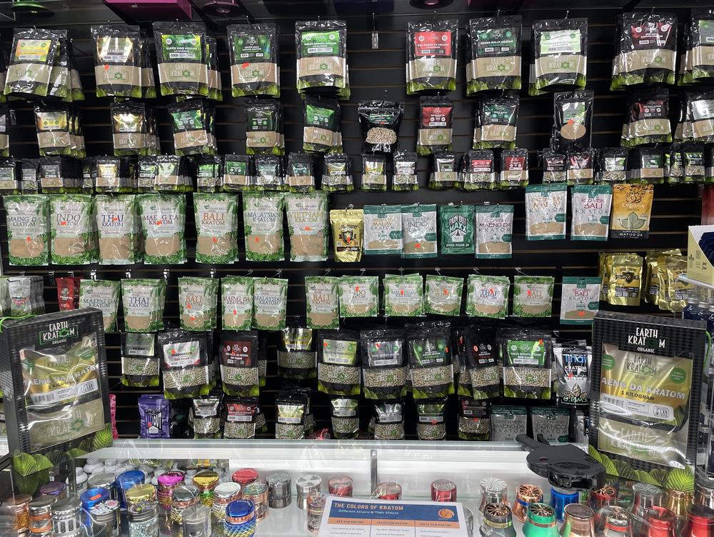 Shelves festooned with kratom powders, capsules, liquids and extracts greet customers at Tifton Tobacco & Vapor in Tifton, Ga. Kratom is a billion-dollar business in the U.S., according to the American Kratom Association.