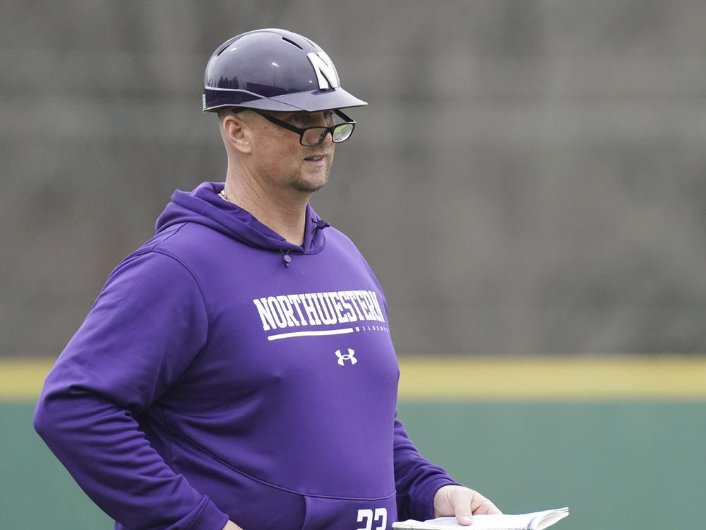 Northwestern head coach Jim Foster looks on from the third base box during an NCAA baseball game against USC Upstate on Sunday, Feb. 26, 2023, in Spartanburg, S.C.