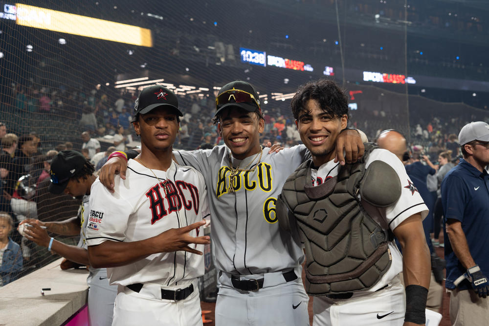 After the game concluded, Mike Dorcean (right) found Rashad Ruff (left) and Jordan Hamberg (center) — his teammates from Coppin State who were also selected for the Swingman Classic.