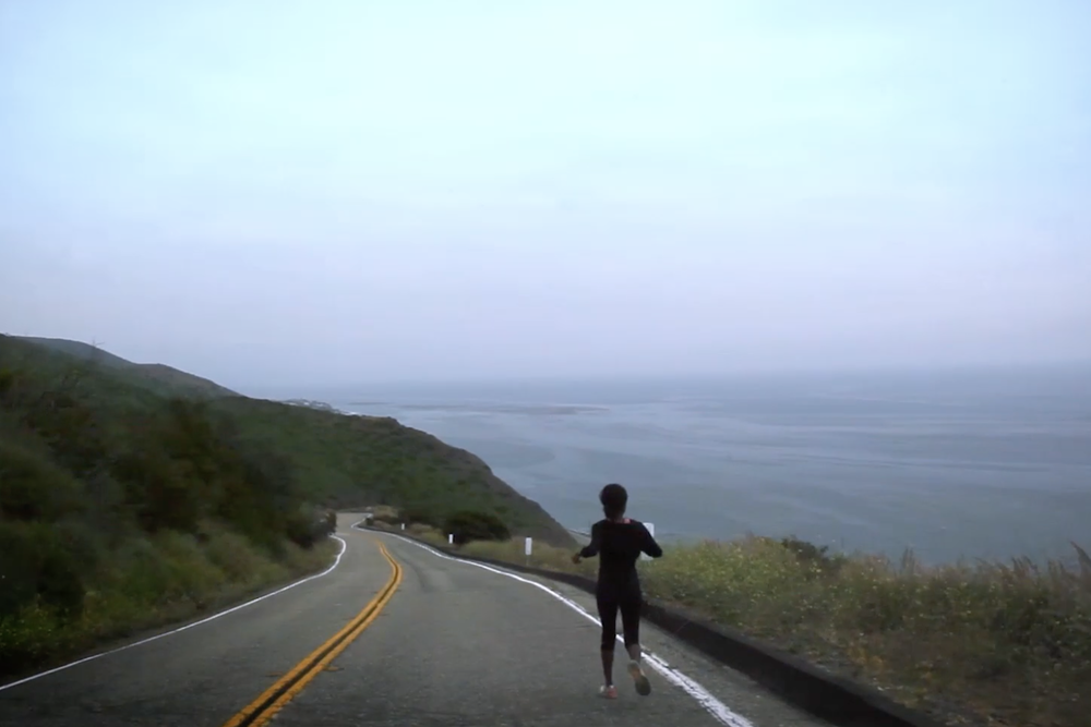 Jenneh Rishe enjoys a run in this still from <em>Below the Belt</em>. After excision surgery for her endometriosis, Rishe can do activities she loves — like running — without pain.