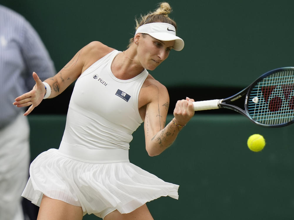 Czech Republic's Marketa Vondrousova in action against Tunisia's Ons Jabeur during the Wimbledon women's singles final in London on Saturday. Vondrousova became the lowest-ranked woman to win the tournament.