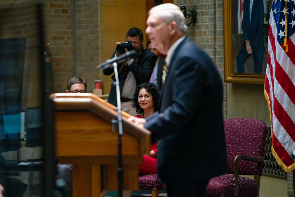 Xochitl Torres Small listens as USDA Secretary Tom Vilsack introduces her ahead of her swearing-in on July 17 in Washington, D.C.