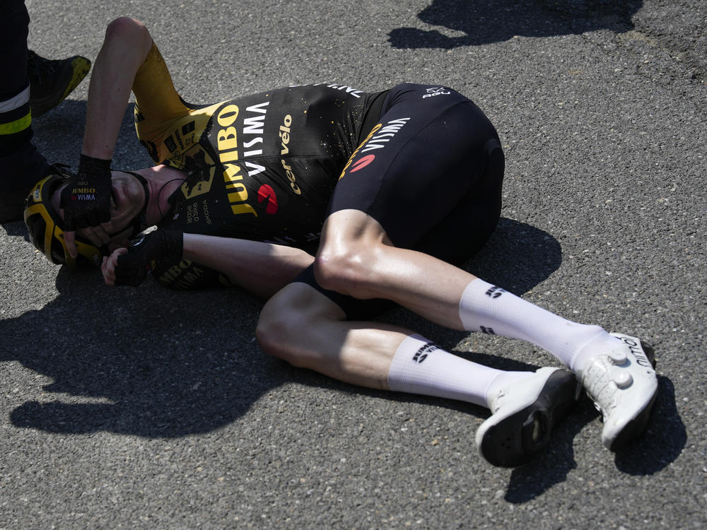 Belgium's Nathan van Hooydonck crashed during the 15th stage of the Tour de France cycling race over 179 kilometers (111 miles) with start in Les Gets Les Portes du Soleil and finish in Saint-Gervais Mont-Blanc, France, Sunday, July 16, 2023.