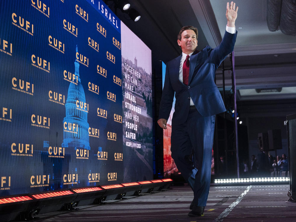 Republican presidential candidate Florida Gov. Ron DeSantis waves as he leaves the stage after speaking to the Christians United For Israel (CUFI) Summit 2023 in Arlington, Va., on Monday.