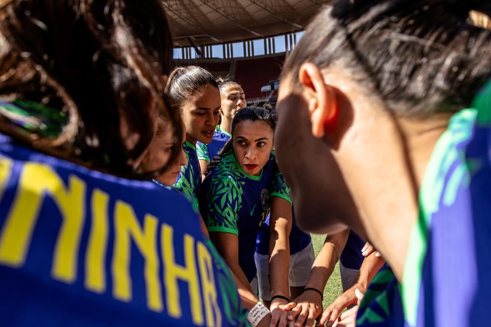 Marta huddles with her team before a friendly game against Chile ahead of the World Cup, in Brasília on July 2.
