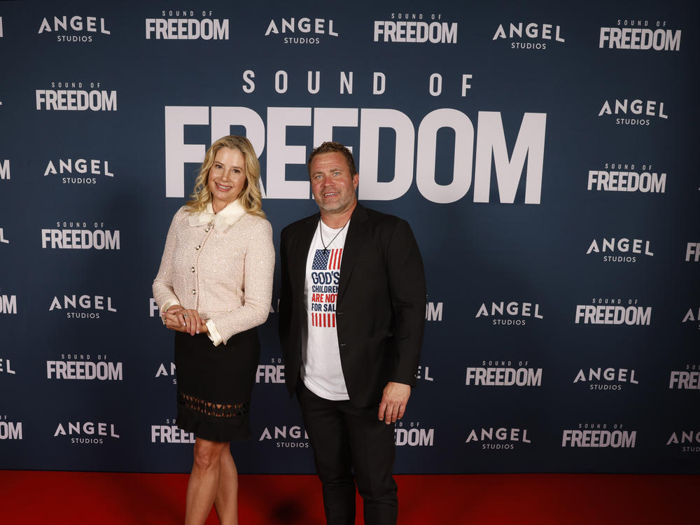 Mira Sorvino and Tim Ballard attend the premiere of <em>Sound of Freedom</em> on June 28 in Vineyard, Utah. Ballard is a former federal agent who went on to found the controversial anti-human trafficking organization depicted in the film.