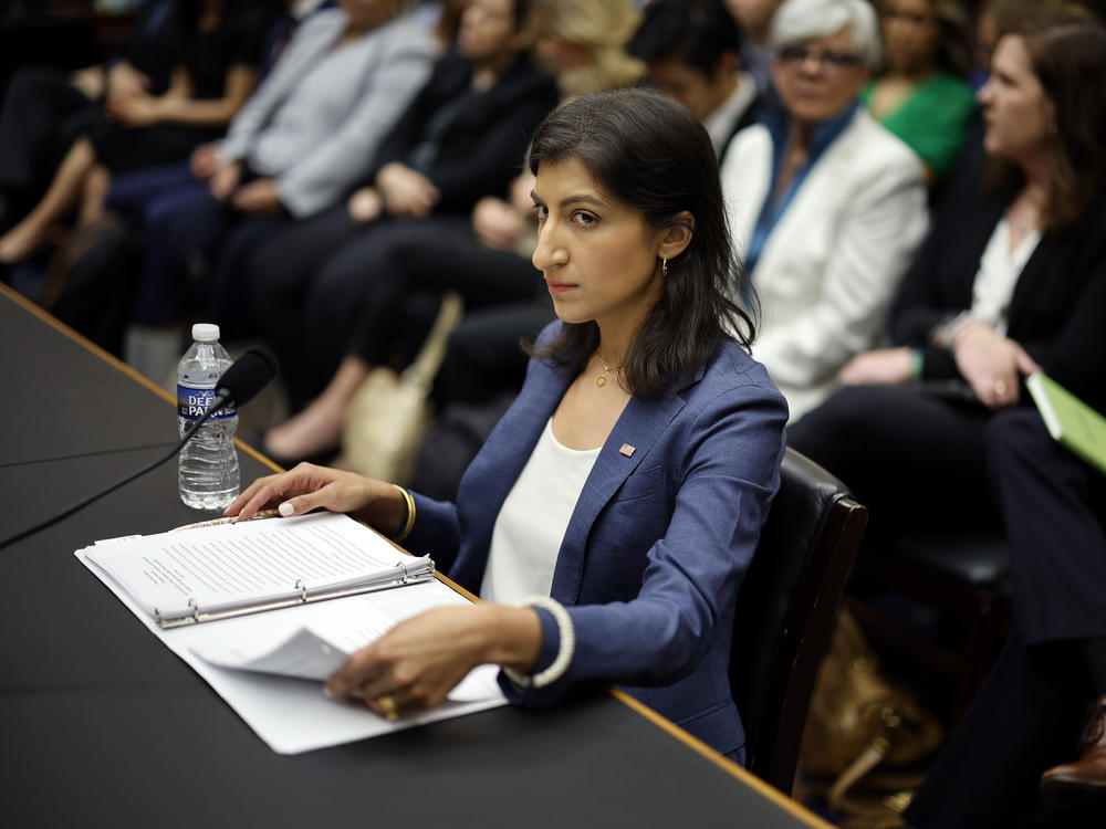 FTC Chair Lina Khan prepares to testify before the House Judiciary Committee on July 13.