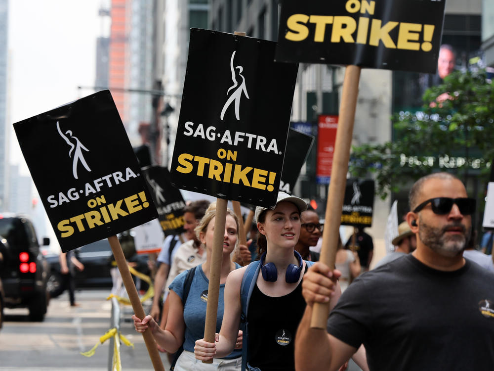 SAG-AFTRA members and supporters protest in front Amazon/HBO in New York City on Tuesday.