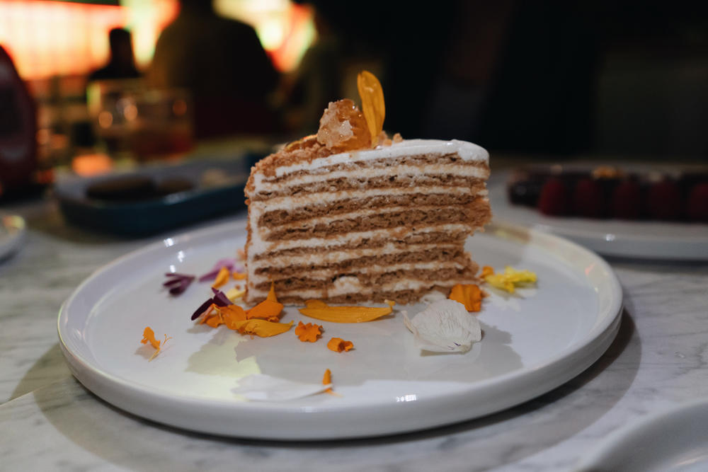 British chef Nadiya Hussain's honey cake with salted hazelnuts rates highly with diners.