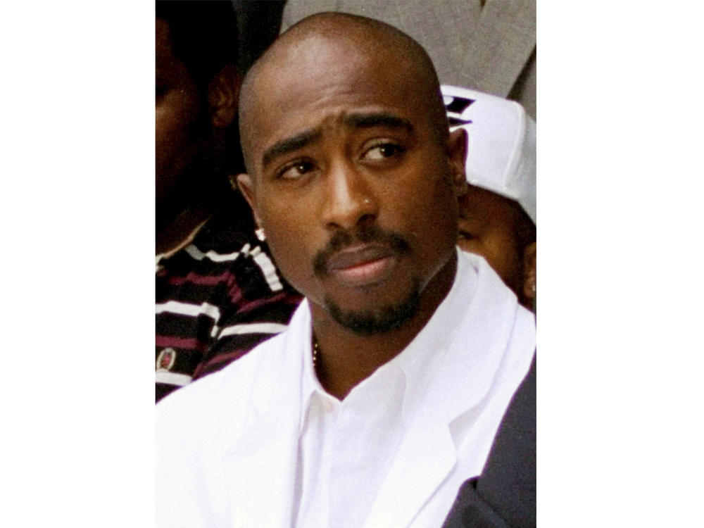 Rapper Tupac Shakur, pictured here in Los Angeles in August 1996, was fatally injured in a drive-by shooting, a case that's never been solved.
