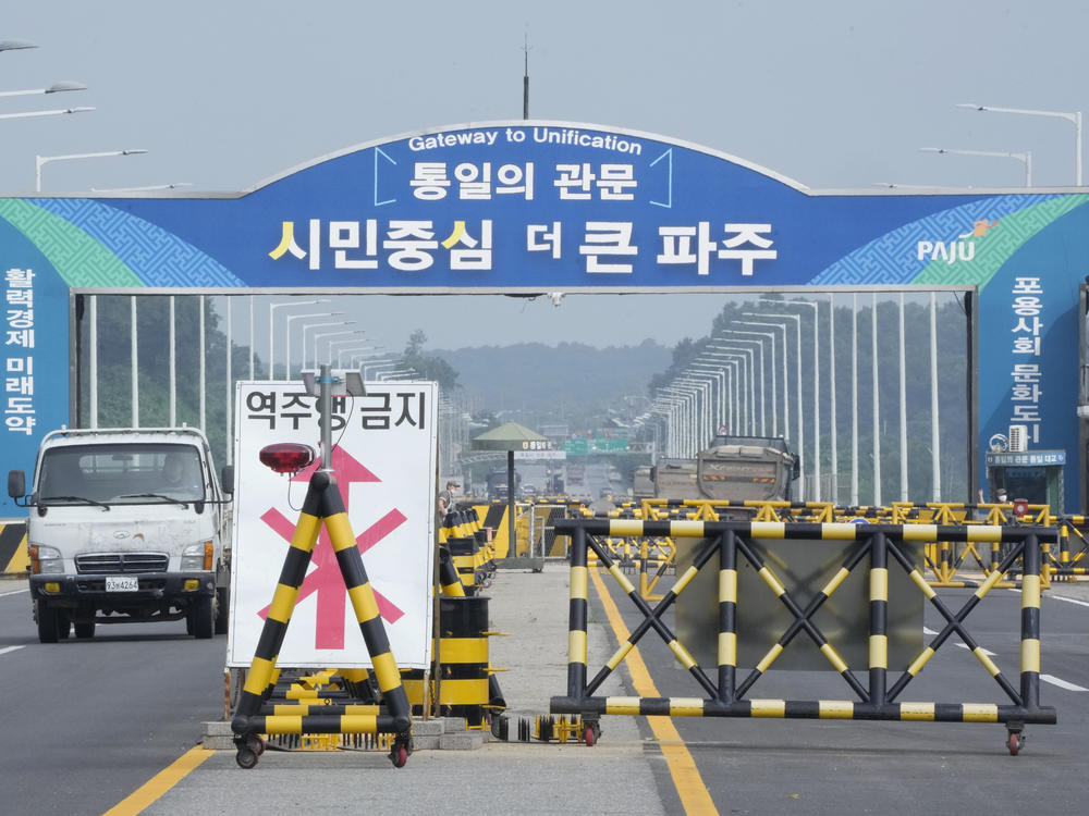 Barricades are seen Wednesday near the Unification Bridge, which leads to Panmunjom, the DMZ village where King crossed the border on Tuesday.