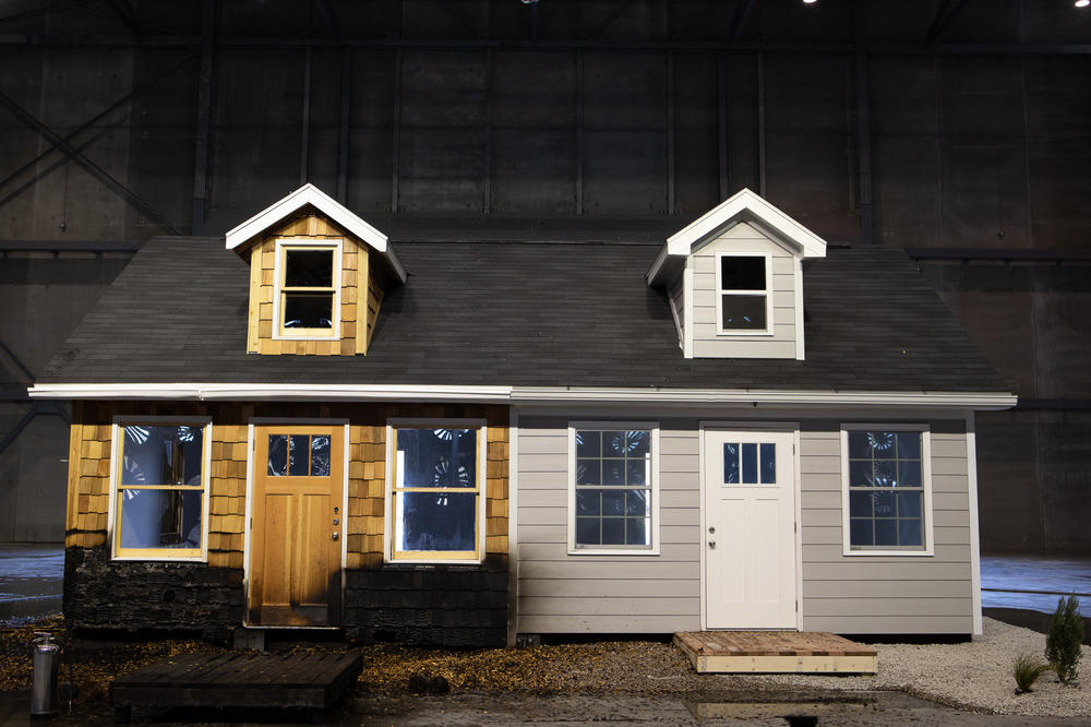 This test home was set on fire at the Insurance Institute for Business and Home Safety, demonstrating the stark benefits of more-resilient building materials compared to traditional materials. Home insurance companies and regulators are pushing for more-resilient homebuilding standards.